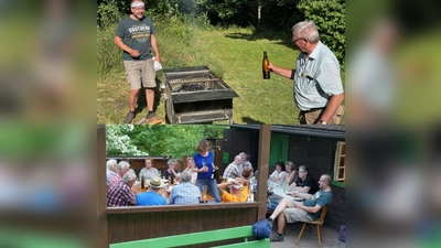 Grilleinweihung durch Sponsor Richard Sperber (re) und Grillmeister Armin Kraus (li)<br>Die hungrigen Aquarienfreunde (Bild: Dieter Eberl)