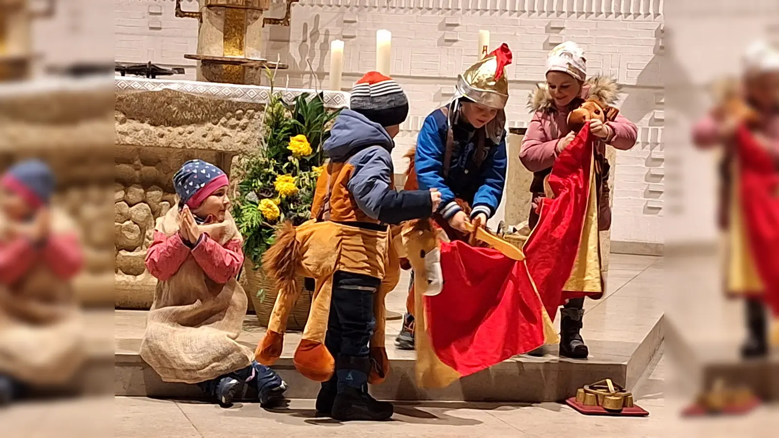 In der Andacht spielen Kinder die Szene nach, in der Martin seinen Mantel teilt und einem frierenden Bettler schenkt. (Bild: lep)