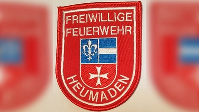 Dies zeigt das Wappen des Klosters Kastl.<br>Die Feuerwehrleute aus Heumaden sind stolz auf ihre Geschichte und tragen die Jacke mit dem Wappen gerne bei öffentlichen Auftritten. <br> (Bild: Peter Garreiss)